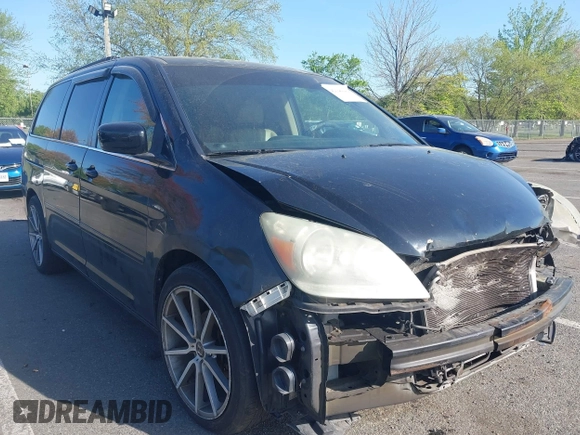 2007 Honda Odyssey EX-L with VIN 5FNRL386X7B128430, listed as a IAAI auction lot 42146089 with 231,059 mi miles and . Bid and sale history available at DreamBid. Image 12.