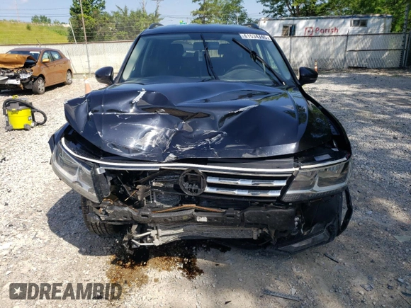 2018 Volkswagen Tiguan S with VIN 3VV0B7AX5JM033302, listed as a Copart auction lot 61534745 with 111,230 mi miles and Salvage title. Bid and sale history available at DreamBid. Image 5.