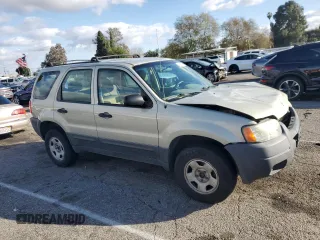 2004 Ford Escape XLS with VIN 1FMYU021X4KA41111, listed as a Copart auction lot 45393765 with 125,492 mi miles and Salvage Title. Bid and sale history available at DreamBid. Image 4.