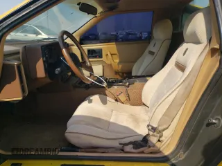 1986 Pontiac Fiero z VIN 1G2PG9796GP256622, wystawiony jako Copart lot #69203894 z przebiegiem 38 964 mil mil oraz Szkody całkowita. Historia ofert i sprzedaży dostępna na DreamBid. Obrazek 7.