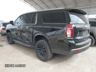 2021 Chevrolet Suburban LT z VIN 1GNSCCKDXMR421833, wystawiony jako IAAI lot #41738389 z przebiegiem 56 757 mil mil oraz . Historia ofert i sprzedaży dostępna na DreamBid. Obrazek 3.