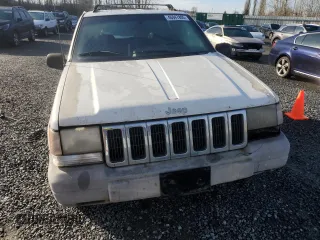 1996 Jeep Grand Cherokee Laredo with VIN 1J4EX58S3TC110154, listed as a Copart auction lot 46947805 with 268,507 mi miles and Salvage Title. Bid and sale history available at carsss.com. Image 5.
