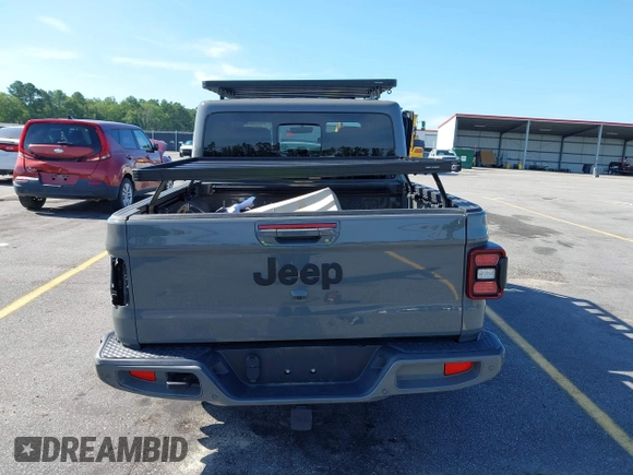 2022 Jeep Gladiator High Altitude with VIN 1C6HJTFG6NL152173, listed as a IAAI auction lot 42524638 with 17,148 mi miles and . Bid and sale history available at DreamBid. Image 17.