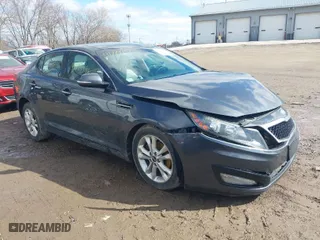 2011 Kia Optima EX with VIN KNAGN4A75B5156895, listed as a IAAI auction lot 41729991 with 151,348 mi miles. Bid and sale history available at carsss.com. Image 1.