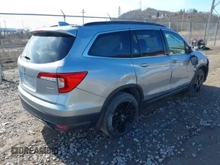 2021 Honda Pilot Special Edition with VIN 5FNYF6H20MB066095, listed as a IAAI auction lot 41863123 with 65,930 mi miles. Bid and sale history available at carsss.com. Image 4.