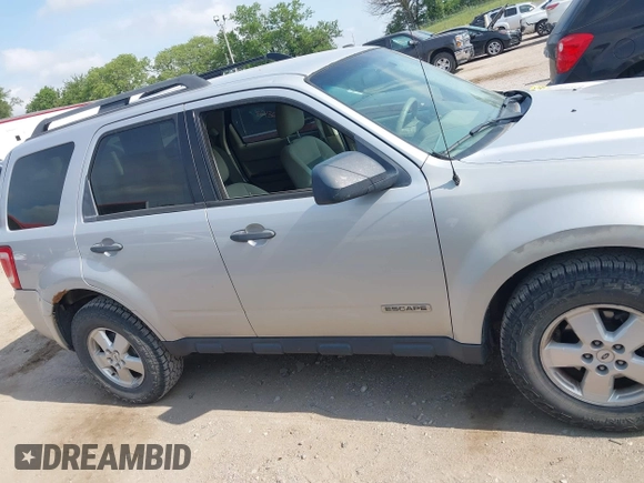 2008 Ford Escape XLT with VIN 1FMCU93188KD05798, listed as a IAAI auction lot 42497044 with 215,954 mi miles and . Bid and sale history available at DreamBid. Image 13.