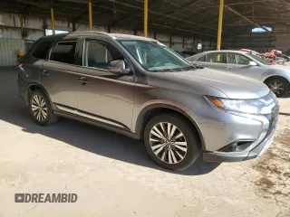 2020 Mitsubishi Outlander SE z VIN JA4AD3A3XLZ035349, wystawiony jako Copart lot #61215315 z przebiegiem 124 728 mil mil oraz Czysty tytuł • Clean title. Historia ofert i sprzedaży dostępna na DreamBid. Obrazek 4.