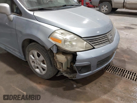 2009 Nissan Versa 1.8 SL with VIN 3N1BC13E29L392172, listed as a IAAI auction lot 41728520 with 170,832 mi miles. Bid and sale history available at carsss.com. Image 6.