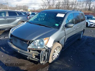 2008 Honda Odyssey EX-L with VIN 5FNRL38708B401000, listed as a IAAI auction lot 41149690 with 111,398 mi miles. Bid and sale history available at carsss.com. Image 2.