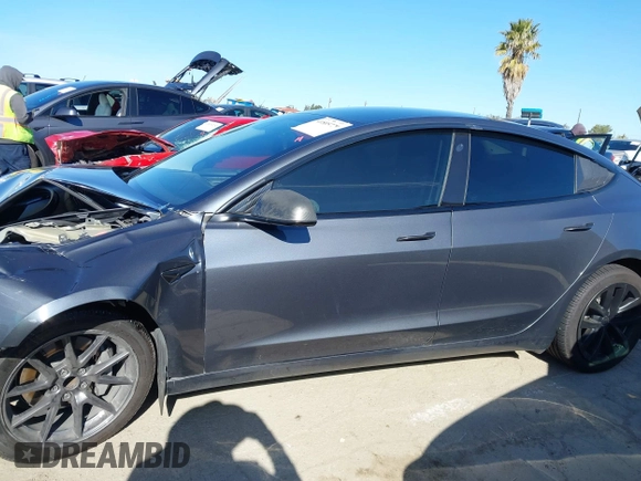 2022 Tesla Model 3 with VIN 5YJ3E1EA3NF165054, listed as a IAAI auction lot 41805729 with 225,773 mi miles. Bid and sale history available at carsss.com. Image 13.