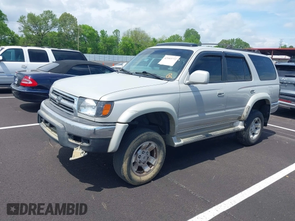2000 Toyota 4Runner SR5 with VIN JT3GN86R1Y0166533, listed as a IAAI auction lot 42103772 with 279,272 mi miles and . Bid and sale history available at DreamBid. Image 2.