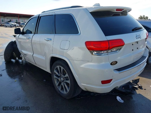 2017 Jeep Grand Cherokee Overland with VIN 1C4RJECGXHC636297, listed as a IAAI auction lot 41661922 with 111,477 mi miles. Bid and sale history available at carsss.com. Image 3.