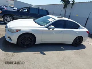 2015 Infiniti Q50 Premium with VIN JN1BV7AP8FM333176, listed as a IAAI auction lot 41990285 with 160,458 mi miles. Bid and sale history available at carsss.com. Image 15.