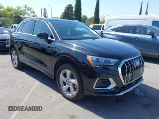 2020 Audi Q3 Premium with VIN WA1AECF31L1040573, listed as a IAAI auction lot 42544089 with 48,797 mi miles and . Bid and sale history available at DreamBid. Image 1.