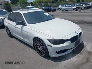 2014 BMW 3 Series 328i with VIN WBA3C1C52EK110753, listed as a IAAI auction lot 42444129 with 169,035 mi miles and . Bid and sale history available at DreamBid. Image 1.