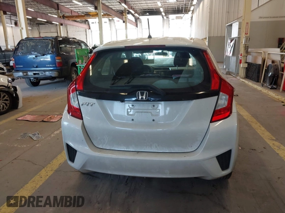 2015 Honda Fit LX with VIN 3HGGK5H57FM106670, listed as a IAAI auction lot 42097655 with 116,303 mi miles and . Bid and sale history available at DreamBid. Image 16.