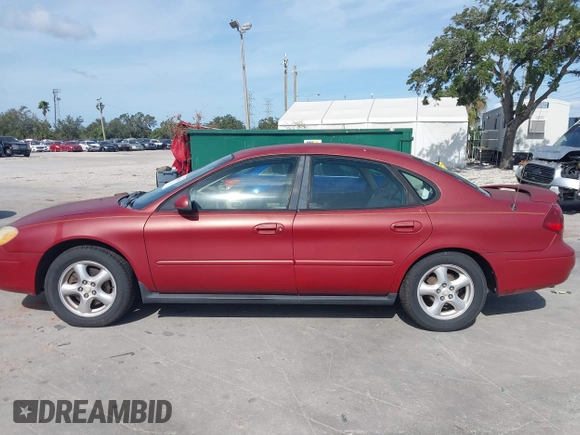 2002 Ford Taurus SES Standard with VIN 1FAFP55S42A135871, listed as a IAAI auction lot 40822596 with 185,605 mi miles. Bid and sale history available at carsss.com. Image 14.