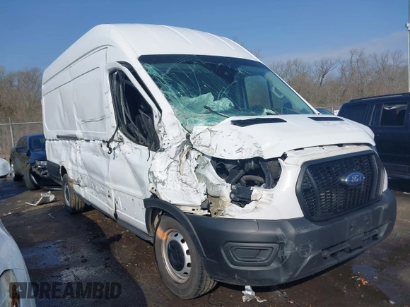2022 Ford Transit Cargo z VIN 1FTBW3X81NKA04543, wystawiony jako IAAI lot #41763336 z przebiegiem 128 518 mil mil oraz . Historia ofert i sprzedaży dostępna na DreamBid. Obrazek 1.