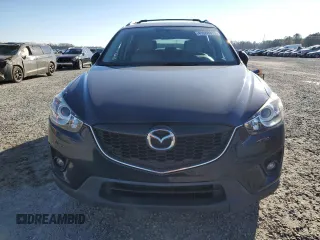 2014 Mazda CX-5 Grand Touring with VIN JM3KE4DY1E0405493, listed as a Copart auction lot 41688915 with 94,970 mi miles and Salvage Title. Bid and sale history available at carsss.com. Image 5.