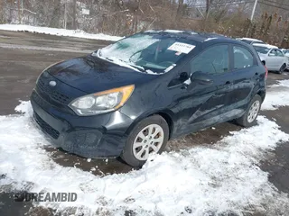 2013 Kia Rio LX with VIN KNADM5A37D6194117, listed as a IAAI auction lot 41522784 with 125,325 mi miles. Bid and sale history available at carsss.com. Image 2.