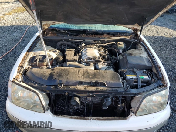 2000 Lexus LS 400 z VIN JT8BH28F0Y0175297, wystawiony jako Copart lot #75230834 z przebiegiem 293 851 mil mil oraz Szkoda całkowita • Salvage title. Historia ofert i sprzedaży dostępna na DreamBid. Obrazek 11.
