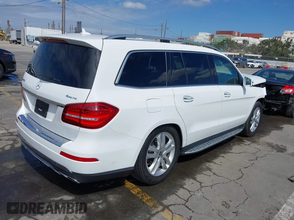 2018 Mercedes-Benz GLS 450 with VIN 4JGDF6EE9JB049030, listed as a IAAI auction lot 41804243 with 60,985 mi miles and . Bid and sale history available at DreamBid. Image 4.