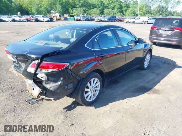 2012 Mazda 6 i Touring with VIN 1YVHZ8DH2C5M23669, listed as a IAAI auction lot 42247758 with 123,389 mi miles and . Bid and sale history available at DreamBid. Image 4.