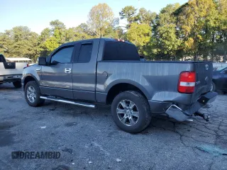 2004 Ford F-150 XLT with VIN 1FTRX12514KD37885, listed as a Copart auction lot 73998724 with 164,189 mi miles and Salvage Title. Bid and sale history available at carsss.com. Image 2.