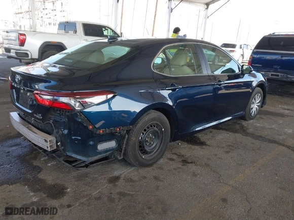 2021 Toyota Camry Hybrid LE with VIN 4T1C31AK5MU566479, listed as a IAAI auction lot 41008865 with 25,703 mi miles. Bid and sale history available at carsss.com. Image 4.