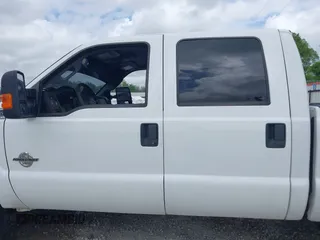 2014 Ford Super Duty F-250 SRW XL with VIN 1FT7W2BT5EEA34333, listed as a IAAI auction lot 41904055 with 200,348 mi miles. Bid and sale history available at carsss.com. Image 14.