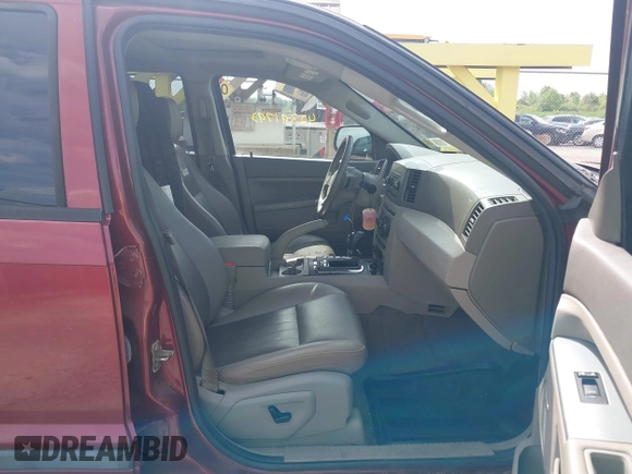 2007 Jeep Grand Cherokee Laredo z VIN 1J8HR48N87C609080, wystawiony jako IAAI lot #42391793 z przebiegiem 159 096 mil mil oraz . Historia ofert i sprzedaży dostępna na DreamBid. Obrazek 5.