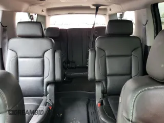 2015 Chevrolet Suburban LTZ with VIN 1GNSKKKC6FR556105, listed as a Copart auction lot 64034304 with 106,269 mi miles and Salvage Title. Bid and sale history available at DreamBid. Image 10.