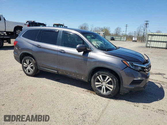 2017 Honda Pilot EX-L with VIN 5FNYF6H51HB086131, listed as a Copart auction lot 53555855 with 133,050 mi miles and Salvage Title. Bid and sale history available at DreamBid. Image 4.