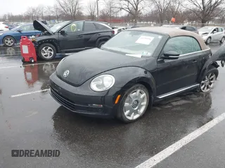 2013 Volkswagen Beetle 2.5L with VIN 3VW5P7AT8DM832656, listed as a IAAI auction lot 41729356 with 124,156 mi miles and . Bid and sale history available at DreamBid. Image 2.
