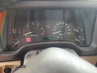 1999 Jeep Wrangler Sahara with VIN 1J4FY49S3XP441051, listed as a Copart auction lot 50946175 with 112,884 mi miles and Salvage Title. Bid and sale history available at carsss.com. Image 9.