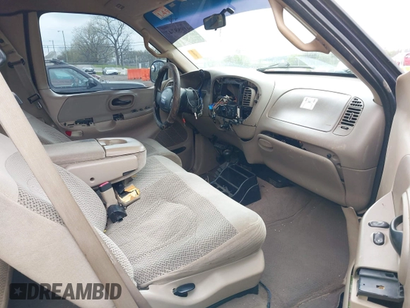 2000 Ford F-150 XL with VIN 1FTRX18L1YNA08999, listed as a IAAI auction lot 41988747 with 214,201 mi miles. Bid and sale history available at carsss.com. Image 5.