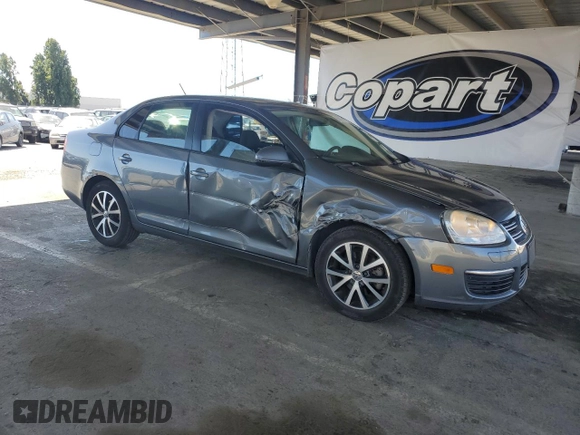 2010 Volkswagen Jetta S with VIN 3VWJZ7AJ9AM052569, listed as a Copart auction lot 59016965 with 166,950 mi miles and Salvage title. Bid and sale history available at DreamBid. Image 4.