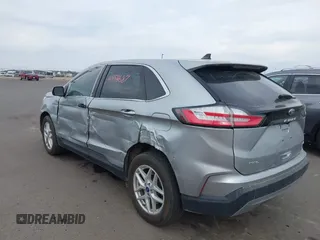 2022 Ford Edge SEL z VIN 2FMPK4J93NBA94793, wystawiony jako IAAI lot #41884687 z przebiegiem 57 372 mil mil oraz . Historia ofert i sprzedaży dostępna na DreamBid. Obrazek 3.