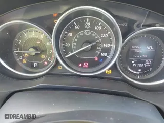 2015 Mazda Mazda6 i Sport with VIN JM1GJ1U60F1163055, listed as a IAAI auction lot 41587300 with 147,927 mi miles. Bid and sale history available at carsss.com. Image 7.