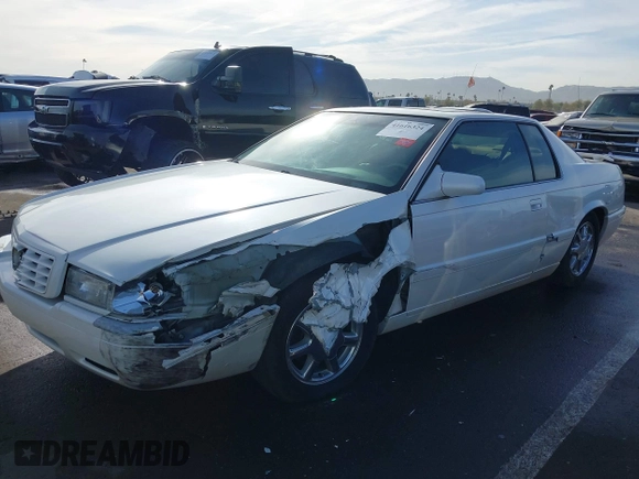 2001 Cadillac Eldorado Touring ETC z VIN 1G6ET12991B104624, wystawiony jako IAAI lot #41616324 z przebiegiem Nie podano mil oraz . Historia ofert i sprzedaży dostępna na DreamBid. Obrazek 17.