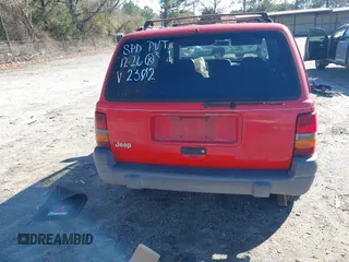 1996 Jeep Grand Cherokee Laredo with VIN 1J4EX58S8TC122302, listed as a IAAI auction lot 41218573 with 195,392 mi miles. Bid and sale history available at carsss.com. Image 16.