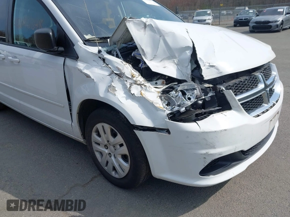 2015 Dodge Grand Caravan SE with VIN 2C4RDGBG6FR613981, listed as a IAAI auction lot 42043348 with 87,615 mi miles and . Bid and sale history available at DreamBid. Image 6.