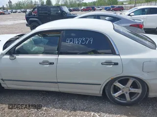 2002 Mitsubishi Diamante LS z VIN 6MMAP57P72T008216, wystawiony jako IAAI lot #42168379 z przebiegiem 154 285 mil mil oraz . Historia ofert i sprzedaży dostępna na DreamBid. Obrazek 15.