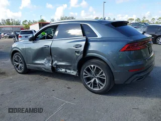 2021 Audi Q8 Premium Plus z VIN WA1EVAF15MD035056, wystawiony jako IAAI lot #41534412 z przebiegiem 65 579 mil mil oraz . Historia ofert i sprzedaży dostępna na DreamBid. Obrazek 12.