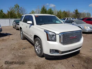 2015 GMC Yukon Denali with VIN 1GKS1CKJ5FR285199, listed as a IAAI auction lot 41763187 with 135,265 mi miles. Bid and sale history available at carsss.com. Image 1.
