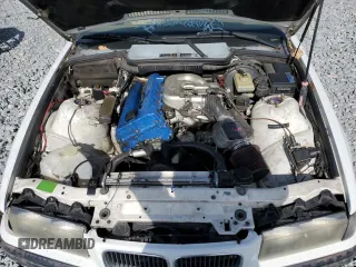 1995 BMW 3 Series 318i z VIN WBABK6322SED17173, wystawiony jako Copart lot #53887285 z przebiegiem Nie podano mil oraz Nie do naprawy • Non repairable. Historia ofert i sprzedaży dostępna na DreamBid. Obrazek 11.