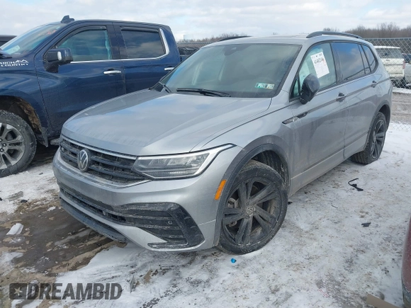 2023 Volkswagen Tiguan SE R-Line Black with VIN 3VV8B7AX3PM106873, listed as a IAAI auction lot 41402146 with 26,701 mi miles and . Bid and sale history available at DreamBid. Image 2.