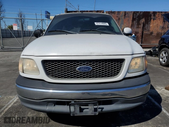 2000 Ford F-150 XL with VIN 1FTZX172XYNC01869, listed as a Copart auction lot 47414095 with 0 mi miles and Salvage Title. Bid and sale history available at carsss.com. Image 5.