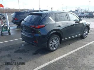 2024 Mazda CX-5 2.5 S Premium Package with VIN JM3KFBDM3R0400333, listed as a IAAI auction lot 41741454 with 14,116 mi miles. Bid and sale history available at carsss.com. Image 4.