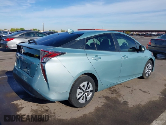 2018 Toyota Prius Two with VIN JTDKBRFUXJ3066430, listed as a IAAI auction lot 42034812 with 119,711 mi miles and . Bid and sale history available at carsss.com. Image 4.